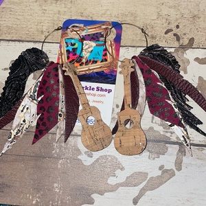 Funky guitar musical leather boho earrings.